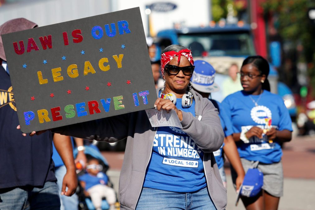 United Auto Workers union members march in the Labor Day Parade in Detroit,
